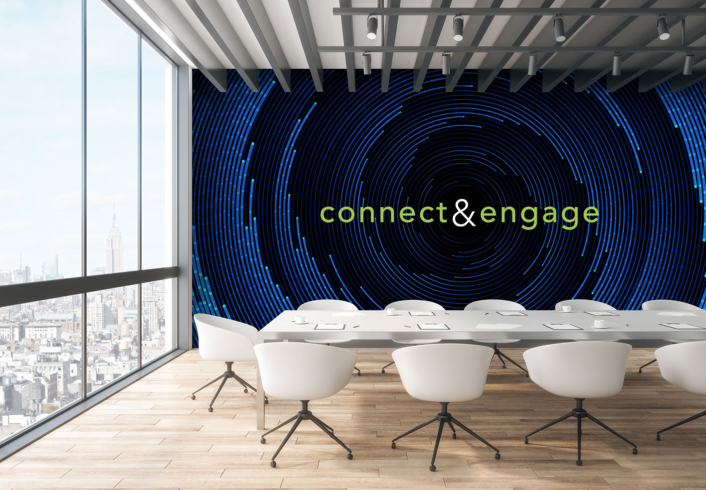 board room with a blue spiral wall that says connect and engage